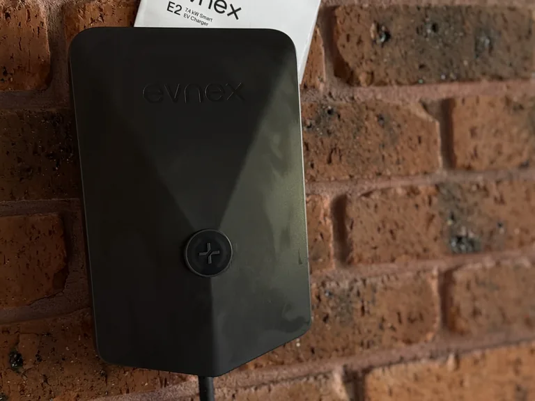 Evnex E2 EV charger on a brick wall
