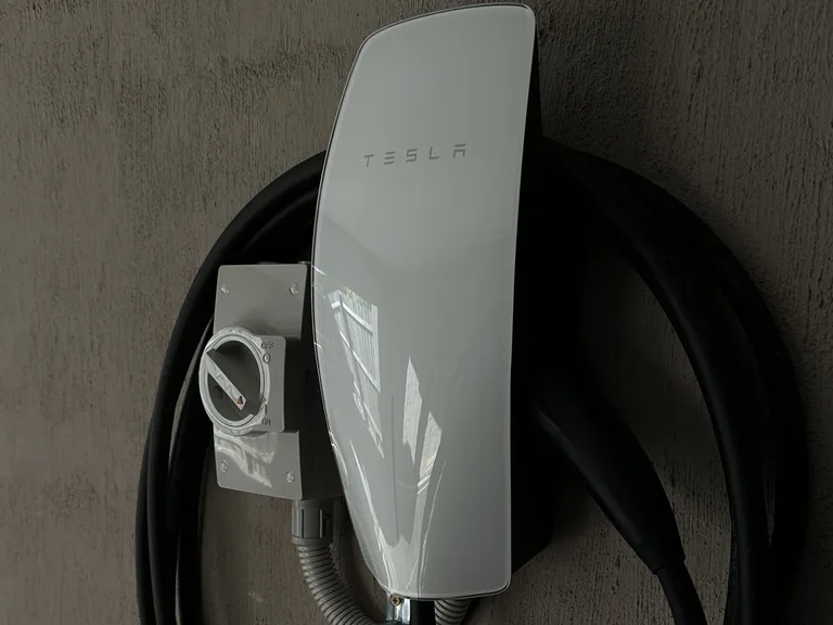 Tesla Wall Connector installed with an isolator