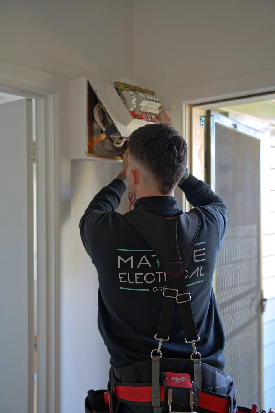 Running dedicated EV charger cabling beneath a weatherboard home