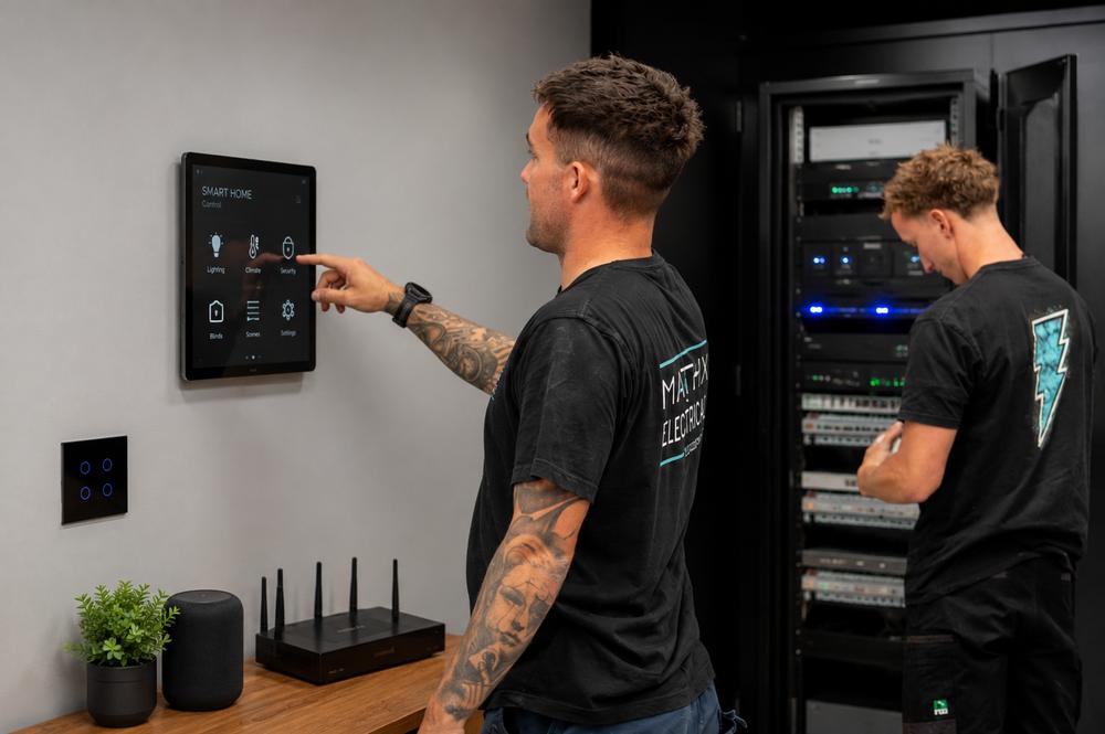 Mitch and Sam with a smart home system